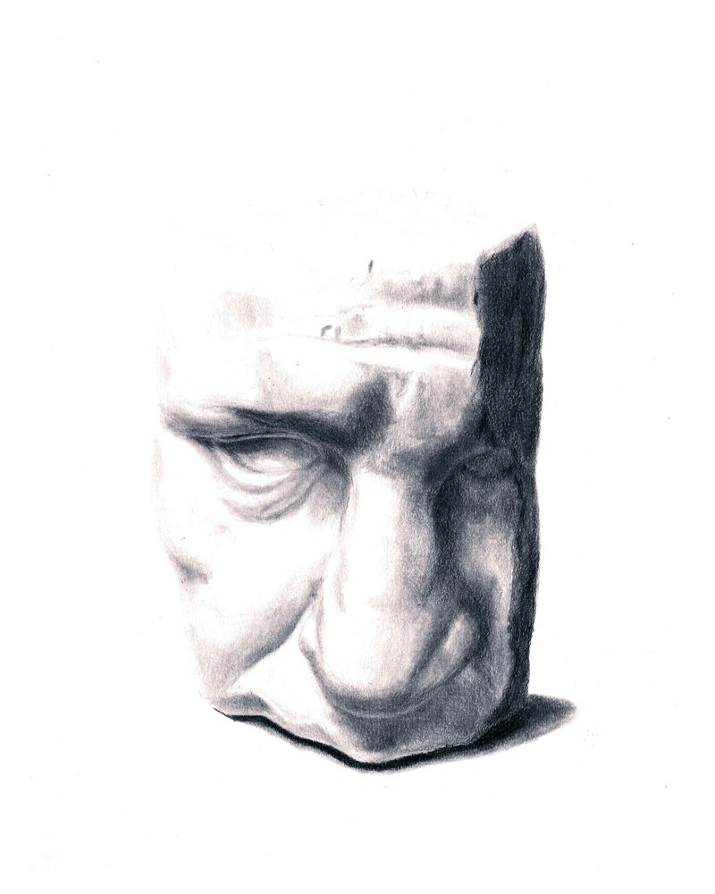 Estudio a grafito de una escultura de un rostro
